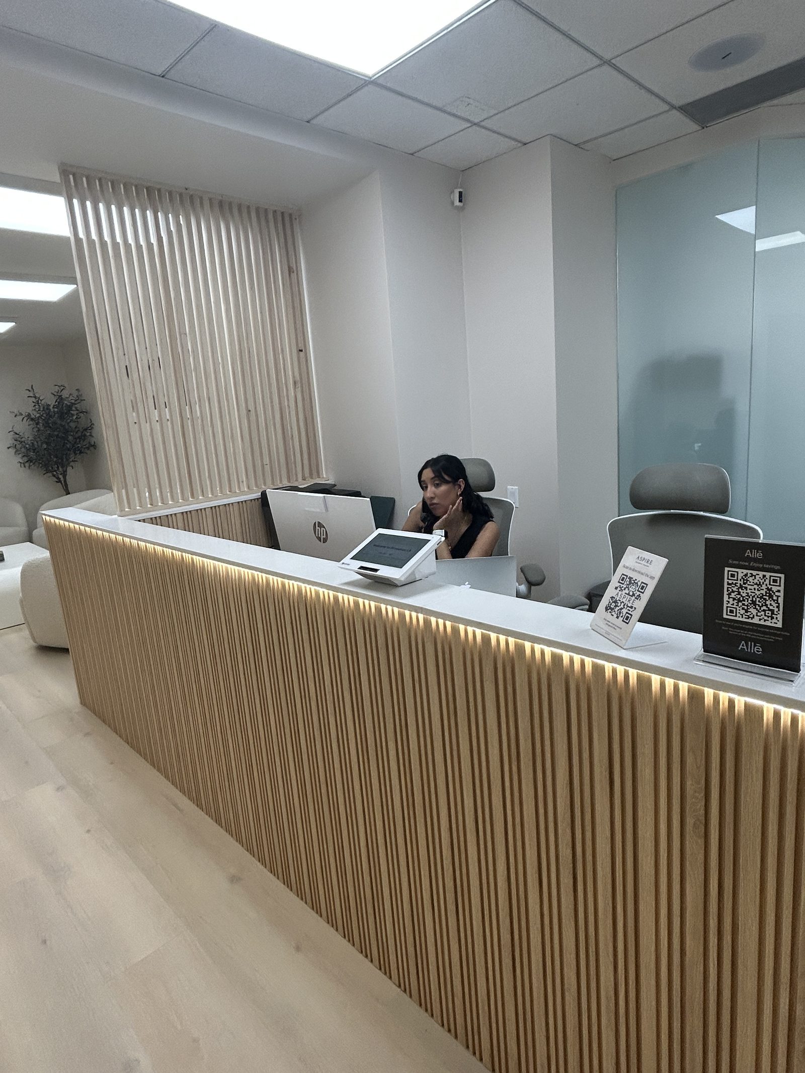 Skinsation LA front desk — staff greet you by name on arrival